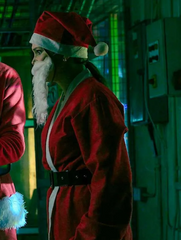 Jingle Bell Heist 2025 Olivia Holt Red Santa Coat