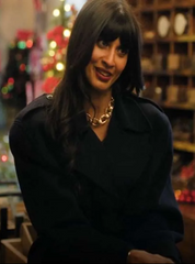A Merry Little Ex-Mas 2025 Jameela Jamil Black Coat