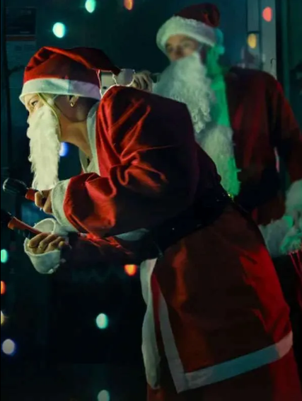 Jingle Bell Heist 2025 Olivia Holt Red Santa Coat