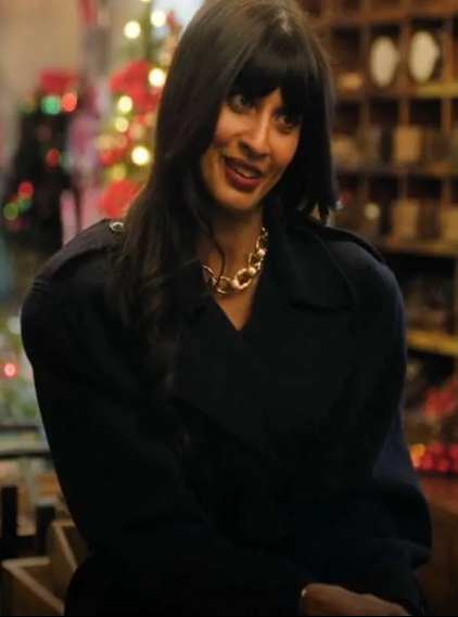 A Merry Little Ex-Mas 2025 Jameela Jamil Black Coat